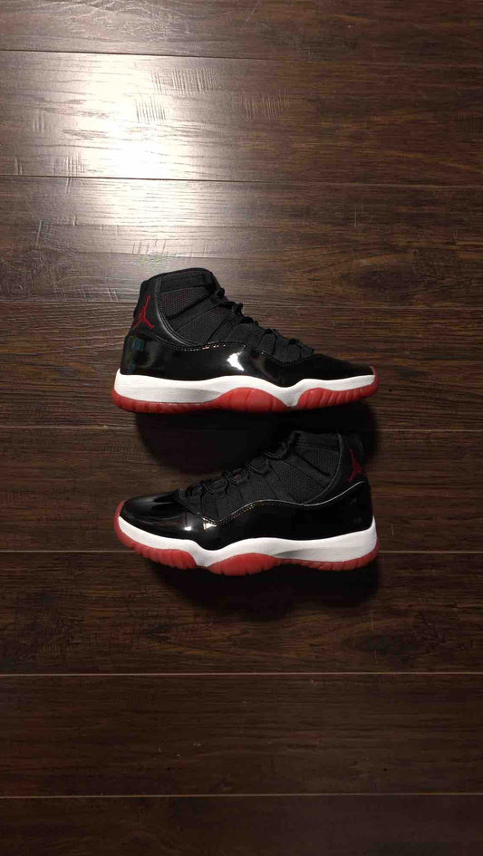 Jordan 11 Retro Playoffs Bred (2019) [USED] - 9 M